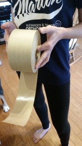 Tape is easy to cut when your model holds the roll.