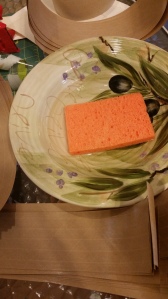 Sponge with water, for activating the paper tape glue.
